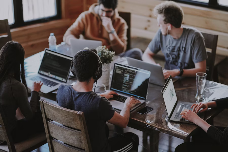 Healthly editorial team discussing content in a modern office
